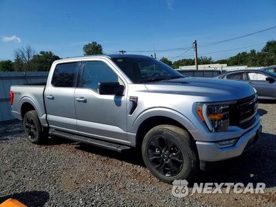 Czwarte zdjęcie samochodu z boku: 2023 FORD F150 SUPERCREW VIN:1FTFW1E80PFB41056 - miniatura