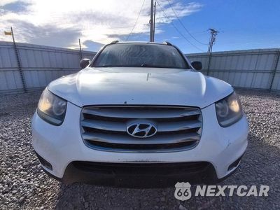 Piąte zdjęcie samochodu w środku: 2012 HYUNDAI SANTA FE GLS VIN:5XYZGDAB0CG099993 - miniatura