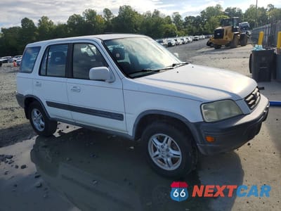 Czwarte zdjęcie samochodu z boku: 1999 HONDA CR-V EX VIN:JHLRD1863XC070565 - miniatura
