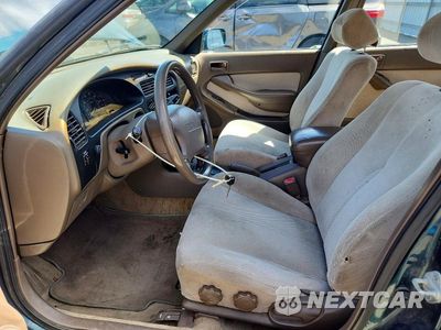 Zdjęcie 7 z 12 samochodu: 1996 TOYOTA CAMRY LE VIN:JT2BG12K3T0413858 - miniatura