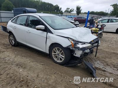Czwarte zdjęcie samochodu z boku: 2017 FORD FOCUS SE VIN:1FADP3F23HL327595 - miniatura