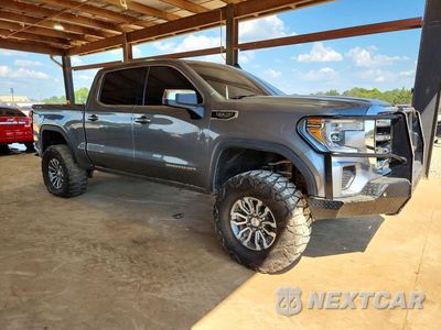 Czwarte zdjęcie samochodu z boku: 2020 GMC SIERRA K1500 SLE VIN:3GTU9BED6LG342924 - miniatura