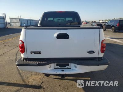 Zdjęcie 6 z 12 samochodu: 2000 FORD F150 VIN:1FTRX07W1YKA80227 - miniatura