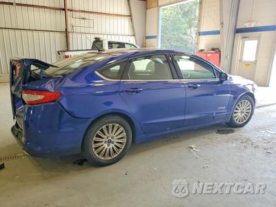 Trzecie zdjęcie samochodu z tyłu: 2016 FORD FUSION SE HYBRID VIN:3FA6P0LU2GR264776 - miniatura