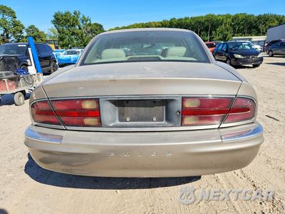 Zdjęcie 6 z 13 samochodu: 2000 BUICK PARK AVENUE VIN:1G4CW52K6Y4116584 - miniatura