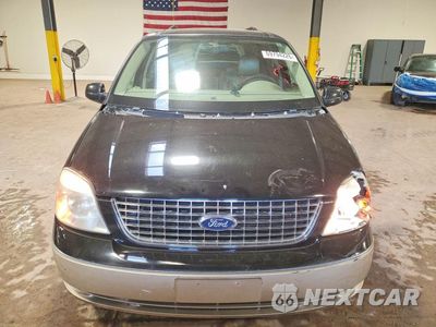 Piąte zdjęcie samochodu w środku: 2004 FORD FREESTAR LIMITED VIN:2FMDA58294BA54902 - miniatura