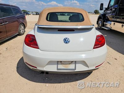Zdjęcie 6 z 12 samochodu: 2013 VOLKSWAGEN BEETLE VIN:3VW5X7AT7DM832552 - miniatura