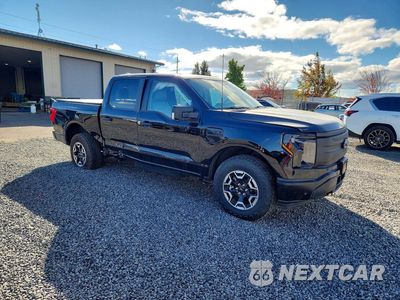 Czwarte zdjęcie samochodu z boku: 2023 FORD F150 LIGHTNING PRO VIN:1FTVW1EL6PWG01529 - miniatura