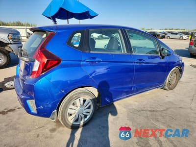 Trzecie zdjęcie samochodu z tyłu: 2015 HONDA FIT LX VIN:3HGGK5H51FM718637 - miniatura