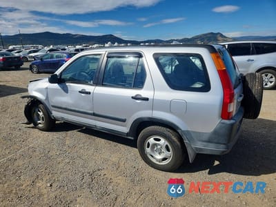 Drugie zdjęcie samochodu z przodu: 2002 HONDA CR-V LX VIN:JHLRD684X2C002459 - miniatura