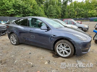Czwarte zdjęcie samochodu z boku: 2023 TESLA MODEL Y VIN:7SAYGDEE3PA193623 - miniatura