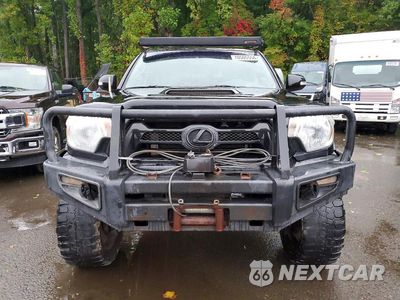 Piąte zdjęcie samochodu w środku: 2013 TOYOTA TACOMA V6 VIN:3TMLU4EN2DM113741 - miniatura