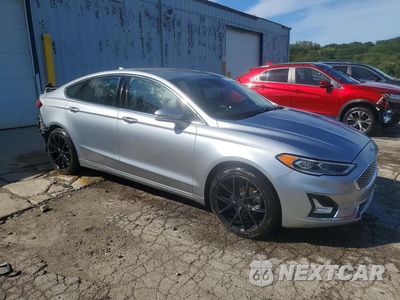 Czwarte zdjęcie samochodu z boku: 2020 FORD FUSION TITANIUM VIN:3FA6P0D92LR193504 - miniatura