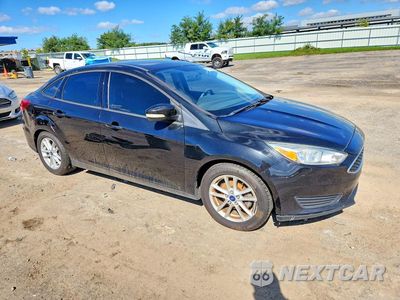 Czwarte zdjęcie samochodu z boku: 2015 FORD FOCUS 4D VIN:1FADP3F29FL253452 - miniatura