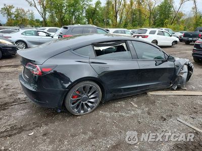 Trzecie zdjęcie samochodu z tyłu: 2023 TESLA MODEL 3 VIN:5YJ3E1EC9PF618064 - miniatura