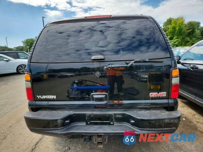 Zdjęcie 6 z 13 samochodu: 2006 GMC YUKON DENALI VIN:1GKEK63U86J105751 - miniatura