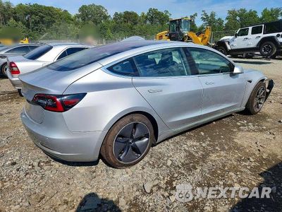 Trzecie zdjęcie samochodu z tyłu: 2018 TESLA MODEL 3 VIN:5YJ3E1EAXJF058643 - miniatura