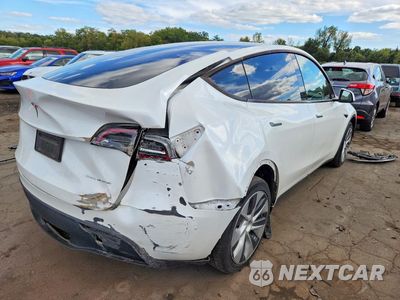 Trzecie zdjęcie samochodu z tyłu: 2023 TESLA MODEL Y VIN:7SAYGDEE8PA129304 - miniatura