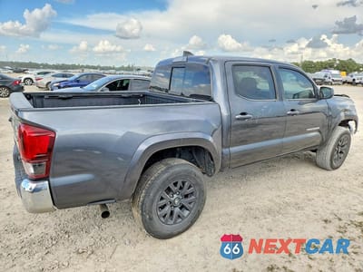 Trzecie zdjęcie samochodu z tyłu: 2023 TOYOTA TACOMA SR5 V6 VIN:3TMAZ5CN0PM202097 - miniatura