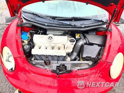 Zdjęcie 11 z 12 samochodu: 2010 VOLKSWAGEN NEW BEETLE VIN:3VWRG3AL0AM005403 - miniatura