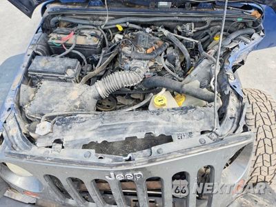 Zdjęcie 12 z 14 samochodu: 2010 JEEP WRANGLER SPORT VIN:1J4AA2D1XAL205383 - miniatura