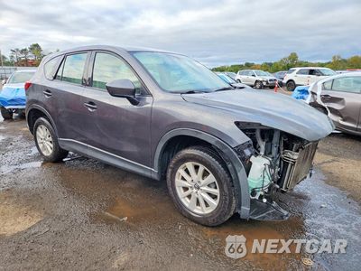 Czwarte zdjęcie samochodu z boku: 2014 MAZDA CX-5 SPORT VIN:JM3KE2BE1E0320179 - miniatura