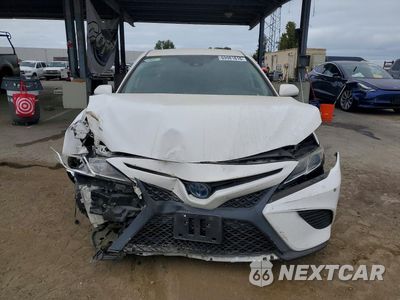 Piąte zdjęcie samochodu w środku: 2019 TOYOTA CAMRY HYBRID SE VIN:4T1B21HK0KU517045 - miniatura