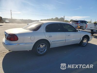 Trzecie zdjęcie samochodu z tyłu: 2001 LINCOLN CONTINENTAL VIN:1LNHM97V51Y633699 - miniatura