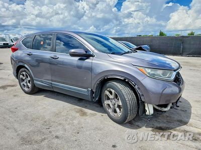 Czwarte zdjęcie samochodu z boku: 2018 HONDA CR-V EXL VIN:7FARW1H80JE050040 - miniatura