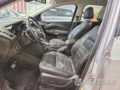 Zdjęcie 7 z 13 samochodu: 2014 FORD ESCAPE TITANIUM VIN:1FMCU0JX6EUC19571 - miniatura