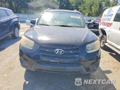 Piąte zdjęcie samochodu w środku: 2012 HYUNDAI SANTA FE GLS VIN:5XYZGDAB0CG099296 - miniatura