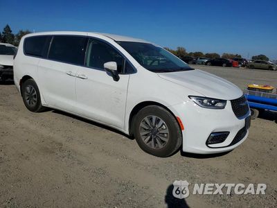Czwarte zdjęcie samochodu z boku: 2023 CHRYSLER PACIFICA HYBRID TOURING L VIN:2C4RC1L7XPR558970 - miniatura