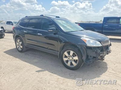 Czwarte zdjęcie samochodu z boku: 2012 CHEVROLET TRAVERSE LTZ VIN:1GNKRLED2CJ401230 - miniatura