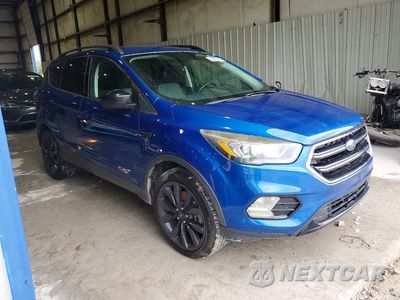 Czwarte zdjęcie samochodu z boku: 2017 FORD ESCAPE SE VIN:1FMCU0G91HUE29587 - miniatura