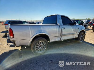 Trzecie zdjęcie samochodu z tyłu: 1999 FORD F150 VIN:1FTRF17L7XNA73732 - miniatura