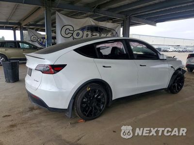 Trzecie zdjęcie samochodu z tyłu: 2023 TESLA MODEL Y VIN:7SAYGDEE7PF792429 - miniatura