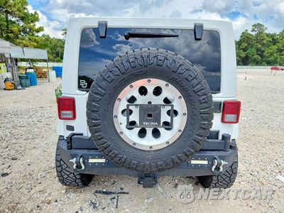 Zdjęcie 6 z 13 samochodu: 2012 JEEP WRANGLER UNLIMITED SAHARA VIN:1C4BJWEG4CL103648 - miniatura