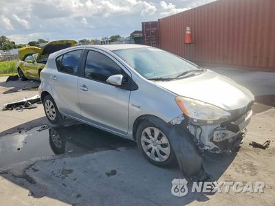 Czwarte zdjęcie samochodu z boku: 2014 TOYOTA PRIUS C ONE VIN:JTDKDTB30E1575187 - miniatura
