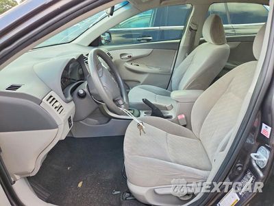 Zdjęcie 7 z 12 samochodu: 2009 TOYOTA COROLLA LE VIN:JTDBL40E799019348 - miniatura