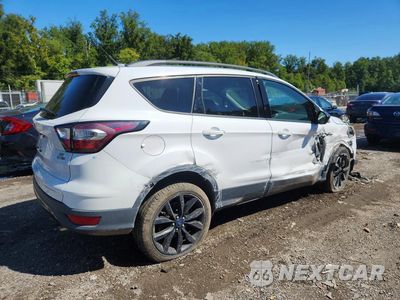 Trzecie zdjęcie samochodu z tyłu: 2017 FORD ESCAPE SE VIN:1FMCU9GDXHUE67389 - miniatura