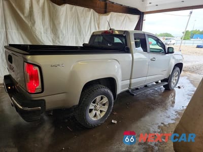 Trzecie zdjęcie samochodu z tyłu: 2016 GMC CANYON SLE VIN:1GTH6CEA1G1114985 - miniatura