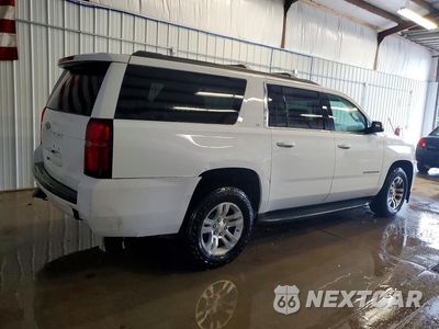 Trzecie zdjęcie samochodu z tyłu: 2018 CHEVROLET SUBURBAN K1500 LT VIN:1GNSKHKC6JR257127 - miniatura