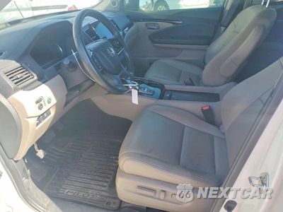 Zdjęcie 7 z 13 samochodu: 2019 HONDA PILOT TOURING VIN:5FNYF6H6XKB052091 - miniatura