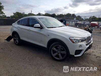 Czwarte zdjęcie samochodu z boku: 2016 BMW X4 XDRIVE28I VIN:5UXXW3C50G0R21147 - miniatura