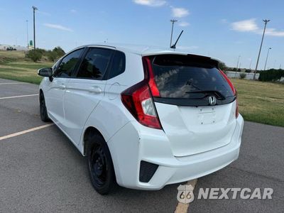 Trzecie zdjęcie samochodu z tyłu: 2015 HONDA FIT LX VIN:3HGGK5G56FM728615 - miniatura