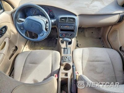 Zdjęcie 8 z 12 samochodu: 2002 SATURN SL1 VIN:1G8ZH52832Z157157 - miniatura