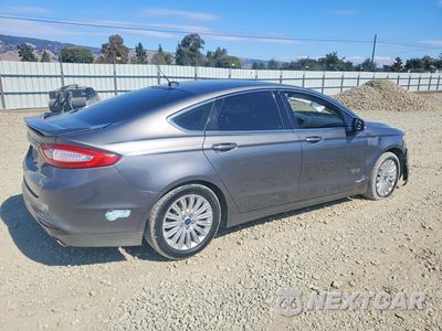 Trzecie zdjęcie samochodu z tyłu: 2014 FORD FUSION TITANIUM PHEV VIN:3FA6P0SU6ER142498 - miniatura