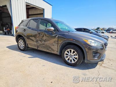 Czwarte zdjęcie samochodu z boku: 2016 MAZDA CX-5 SPORT VIN:JM3KE2BY3G0642576 - miniatura