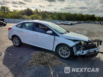 Czwarte zdjęcie samochodu z boku: 2018 FORD FOCUS SE VIN:1FADP3F28JL212044 - miniatura