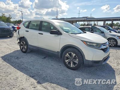 Czwarte zdjęcie samochodu z boku: 2017 HONDA CR-V LX VIN:5J6RW5H36HL002518 - miniatura